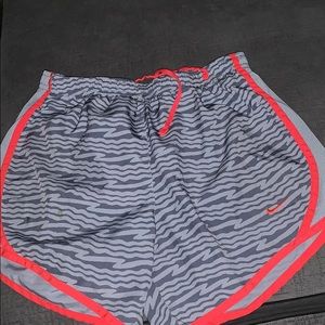 Nike Shorts fit like adult small